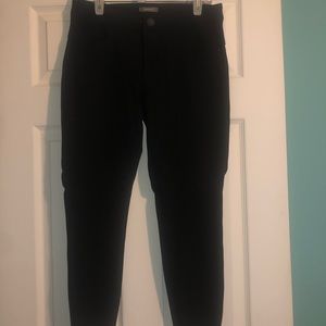 Maurice’s size medium short. Black pants. Can dress up for work or down.